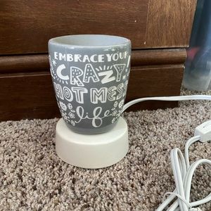 Scentsy mini warmer on a base